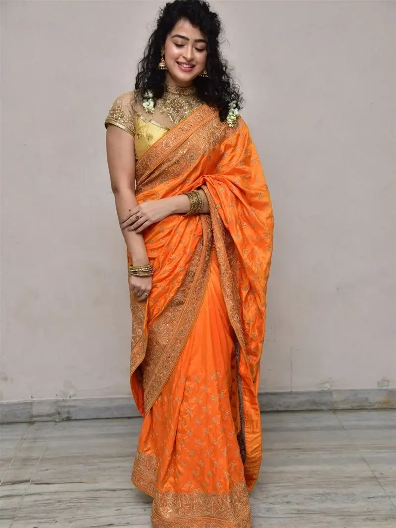 Actress Apsara Rani in Orange Saree at Talakona Movie Launch